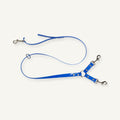 Custom TPU double dog leash coupler shown in blue with dual swivel clips