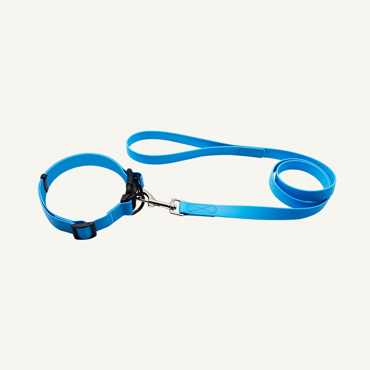 Custom solid PVC quick release dog collar leash set shown in blue with adjustable buckle collar and lead
