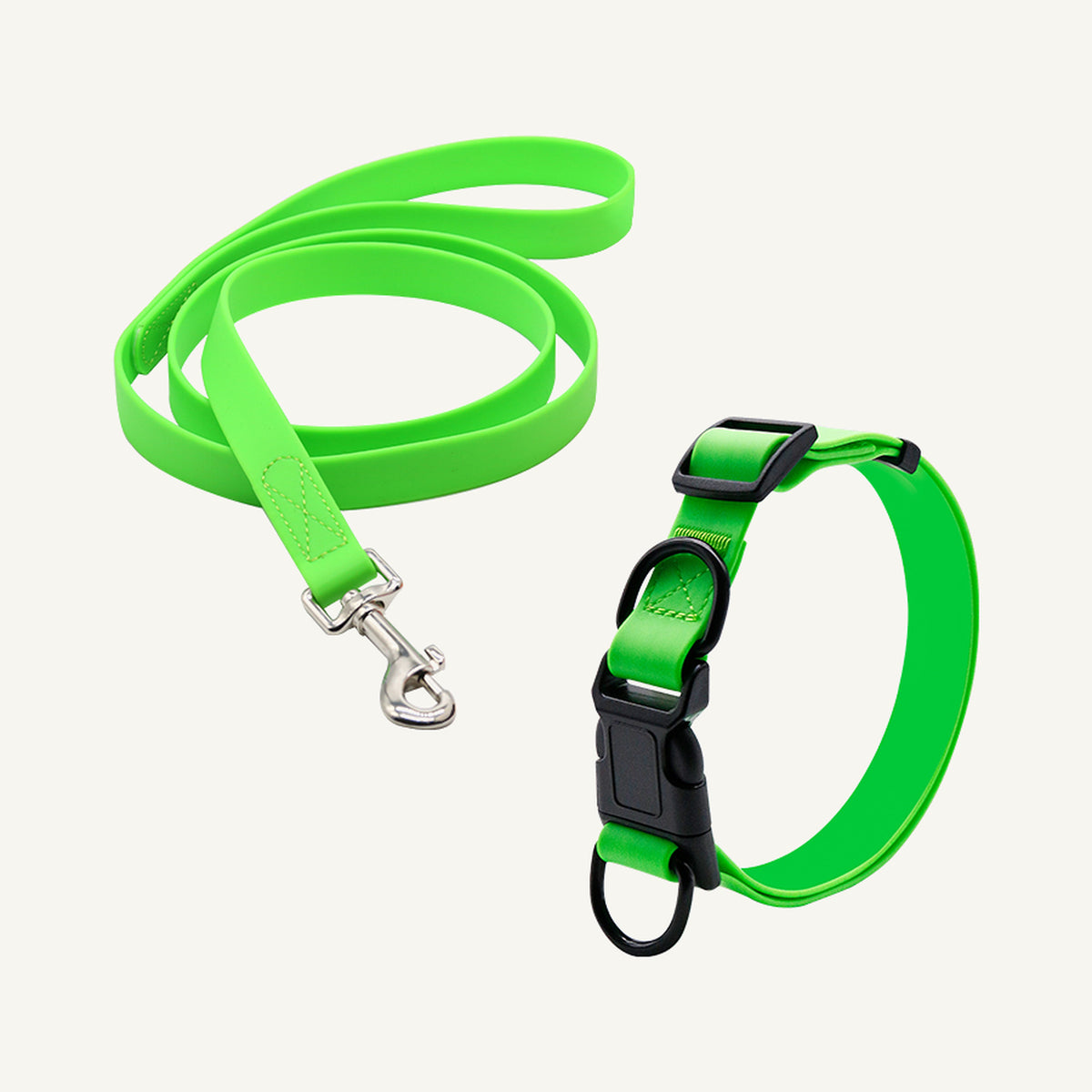 Custom solid PVC quick release dog collar leash set shown in green with adjustable buckle collar and lead