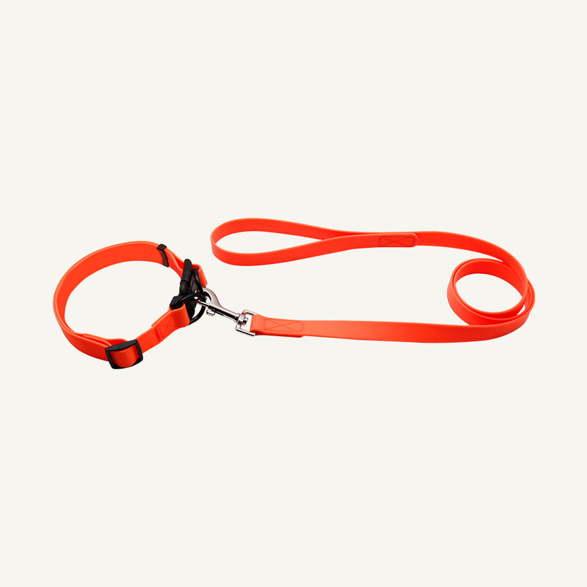 Custom solid PVC quick release dog collar leash set shown in orange with adjustable buckle collar and lead