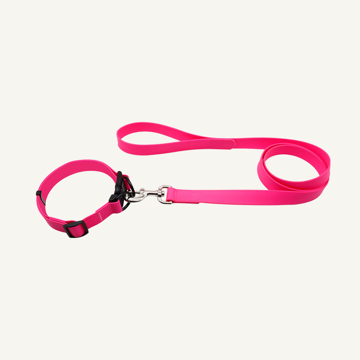 Custom solid PVC quick release dog collar leash set shown in pink with adjustable buckle collar and lead
