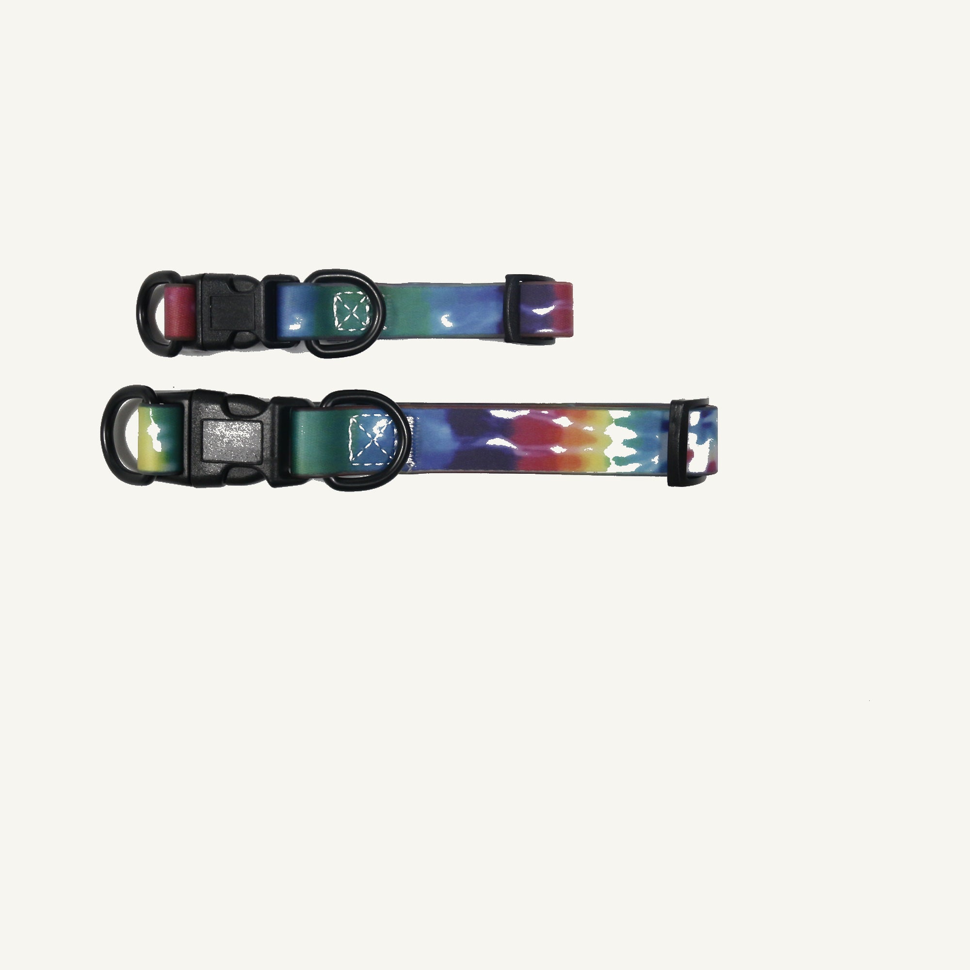 Custom tie dye printed PVC dog collar leash set showing two adjustable collars with black quick release buckles