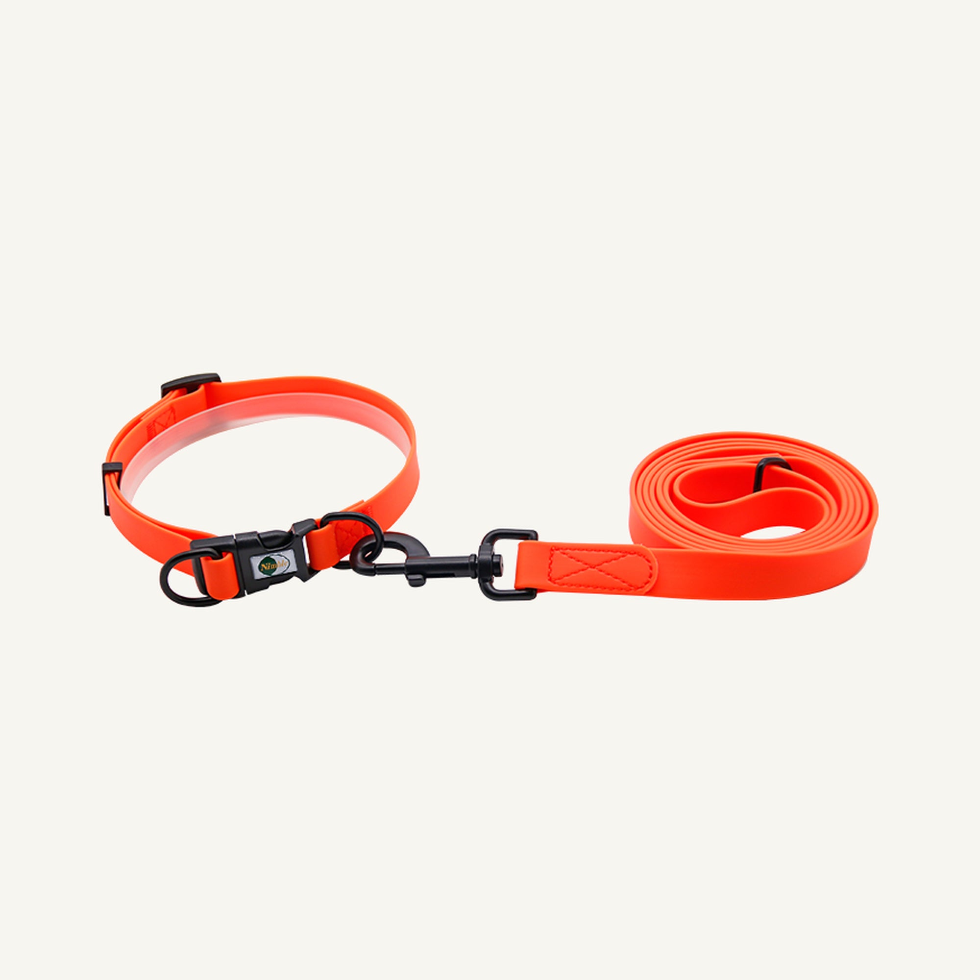 Custom waterproof PVC quick release dog collar leash set shown in orange with black hardware and lead