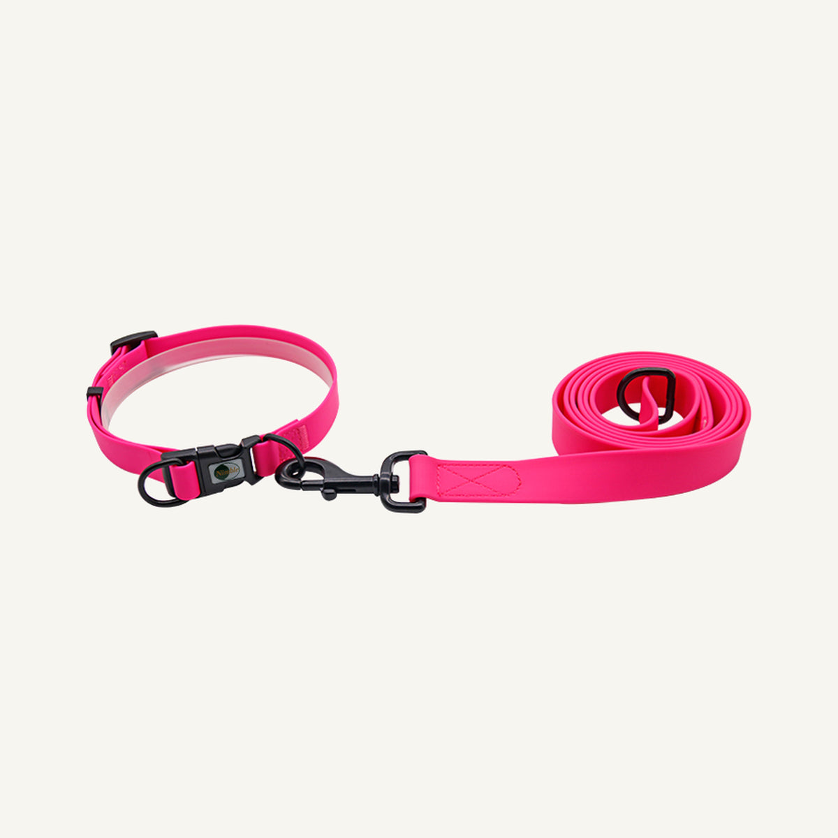 Custom waterproof PVC quick release dog collar leash set shown in pink with black hardware and lead