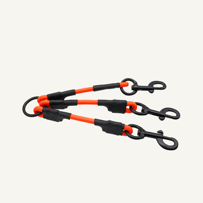Custom waterproof PVC triple dog leash splitter highlighting three branch clips and protective sleeves