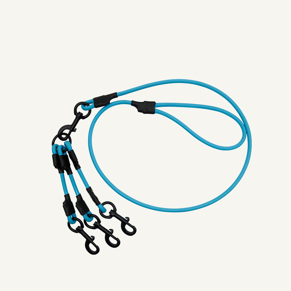 Custom waterproof PVC triple dog leash splitter shown in blue with matching lead and three branches