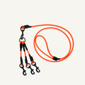 Custom waterproof PVC triple dog leash splitter shown in bright orange with three secure clips