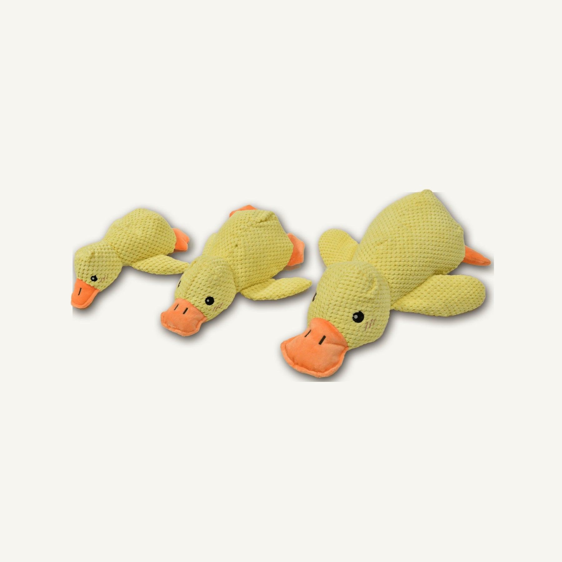 Large Squeaky Yellow Duck – GMR415-L top perspective view on warm neutral background for wholesale pet brands