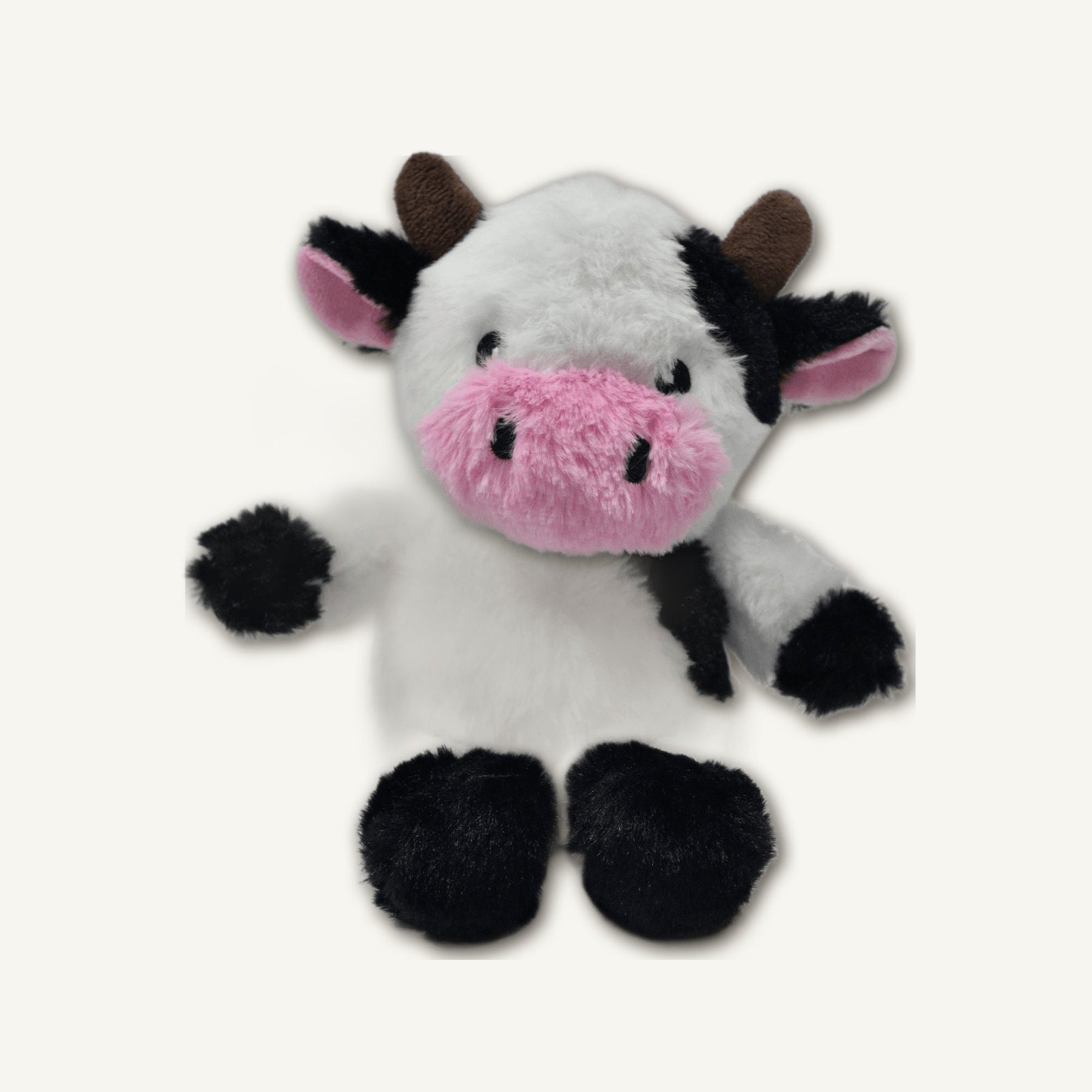 Seated Cow Plush Toy – GMR464 hero product view on warm neutral background for wholesale pet brands