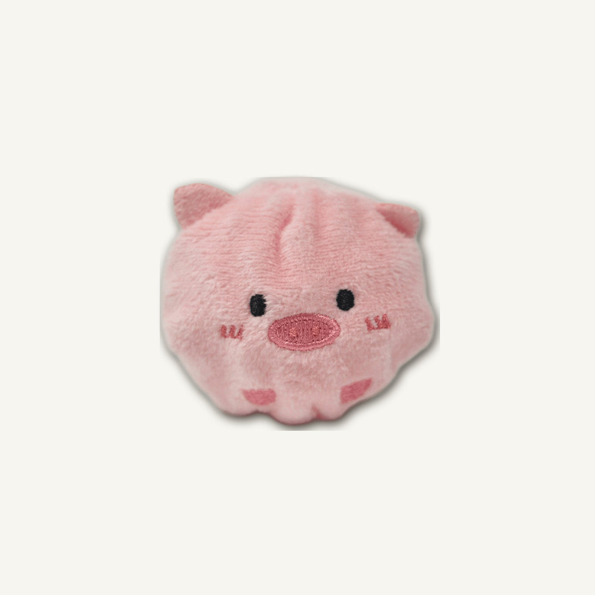 Cute Pig Spiky Ball – GMR520 hero product view on warm neutral background for wholesale pet brands