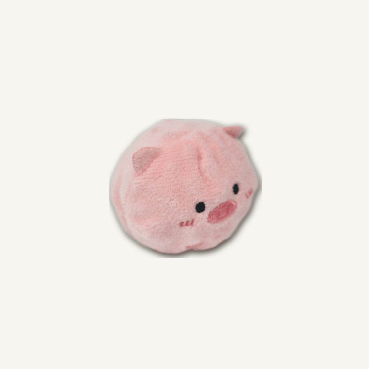 Cute Pig Spiky Ball – GMR520 side perspective view on warm neutral background for wholesale pet brands