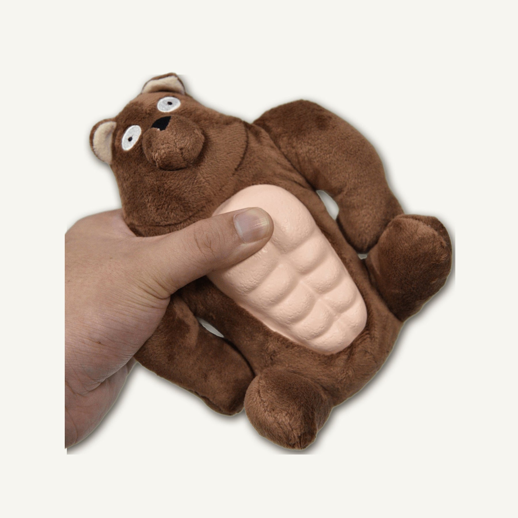 Small Muscle Bear Rubber Plush Toy – GMX102 top perspective view on warm neutral background for wholesale pet brands