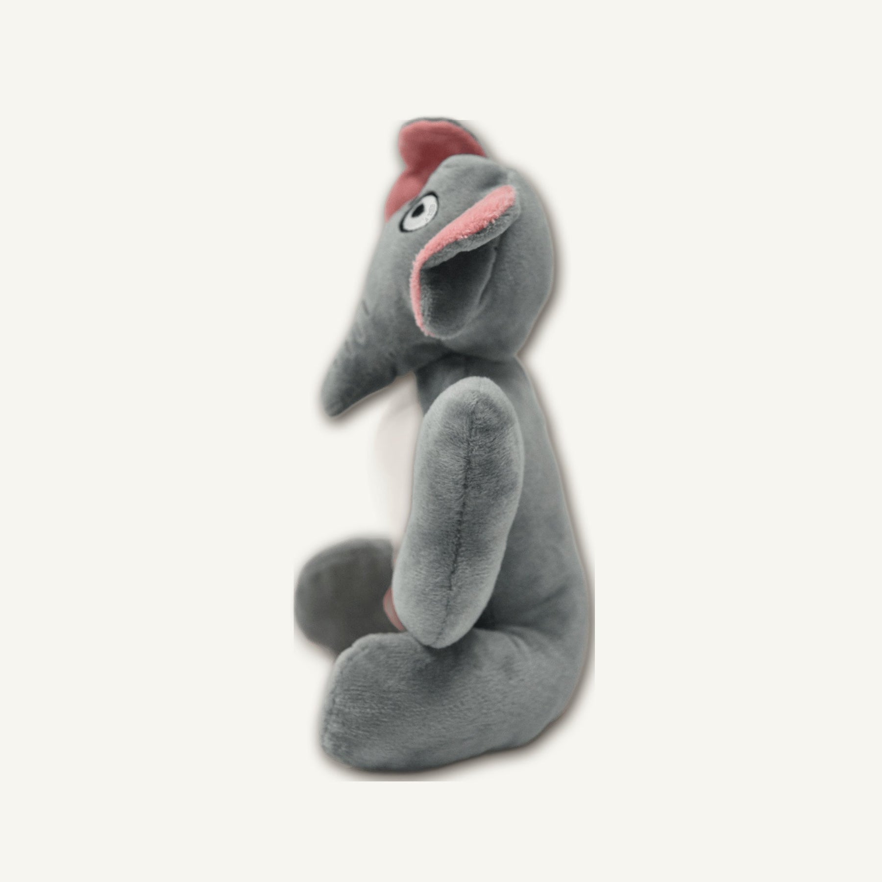 Small Muscle Elephant Rubber Plush Toy – GMX103 side perspective view on warm neutral background for wholesale pet brands