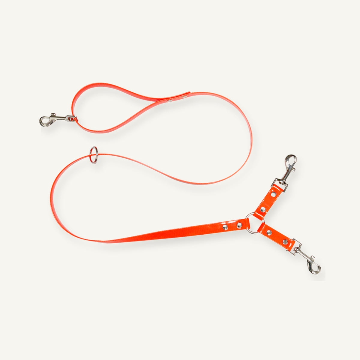 Orange TPU double dog leash coupler displaying main lead and two branch clips
