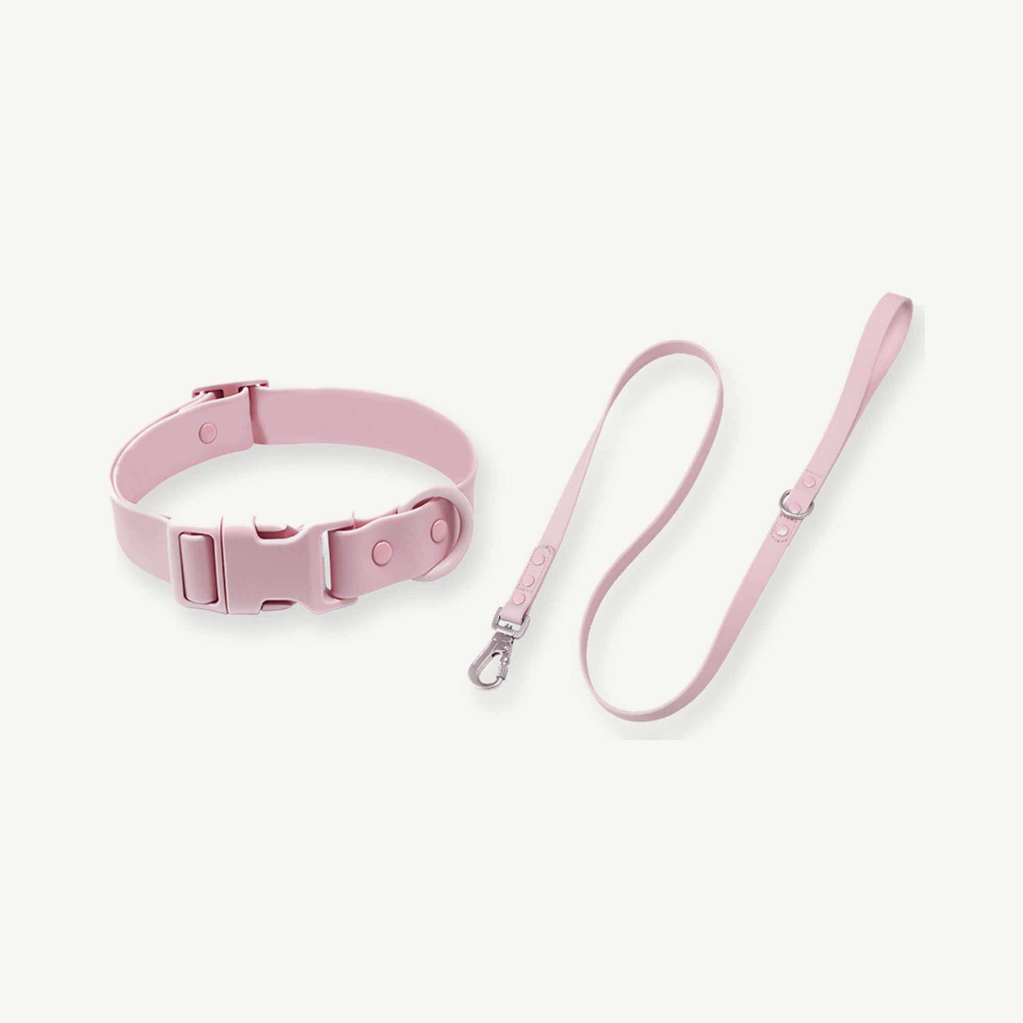 Pink PVC quick release dog collar leash set displayed with coordinated coated straps