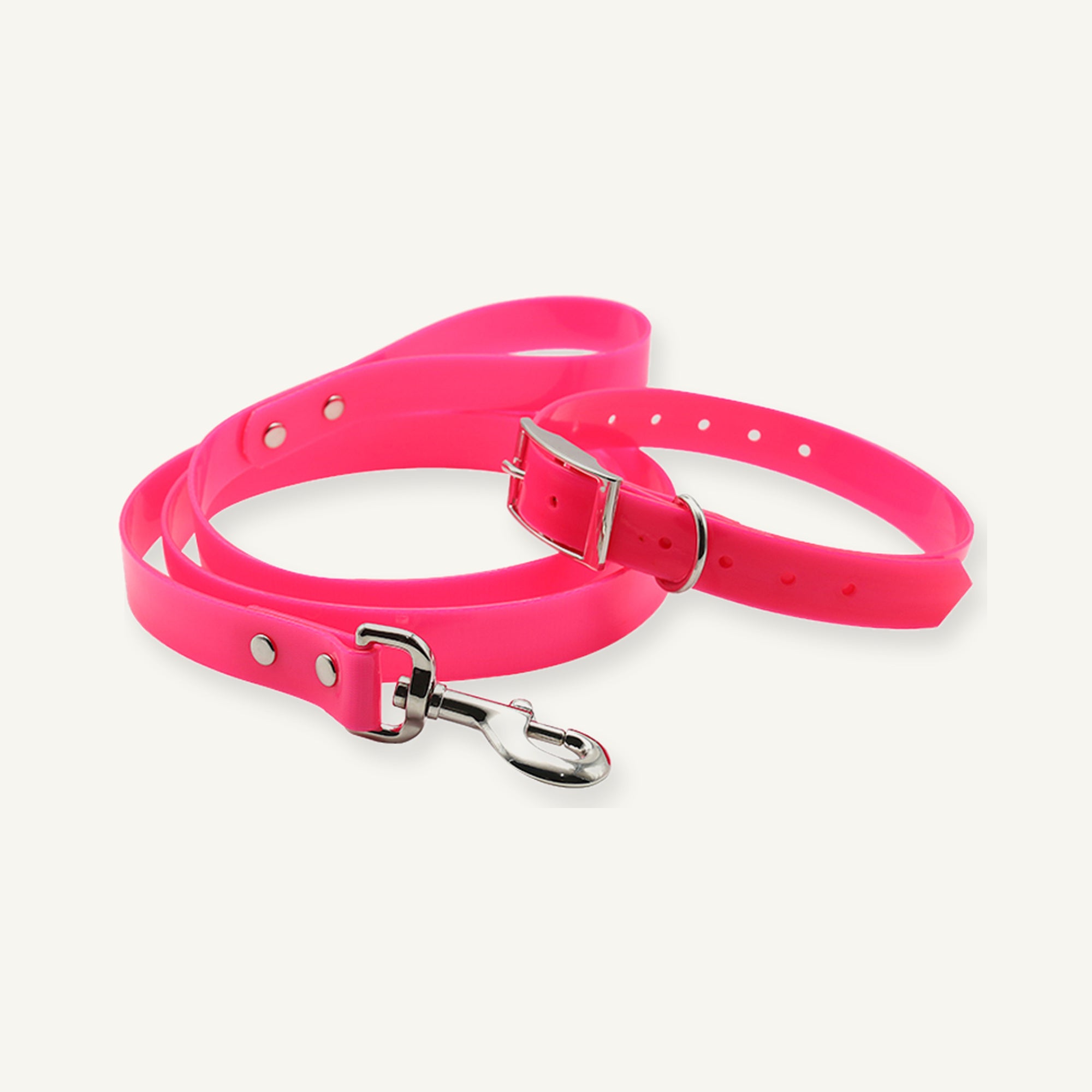 Pink TPU dog collar and leash set displayed with adjustable pin buckle collar