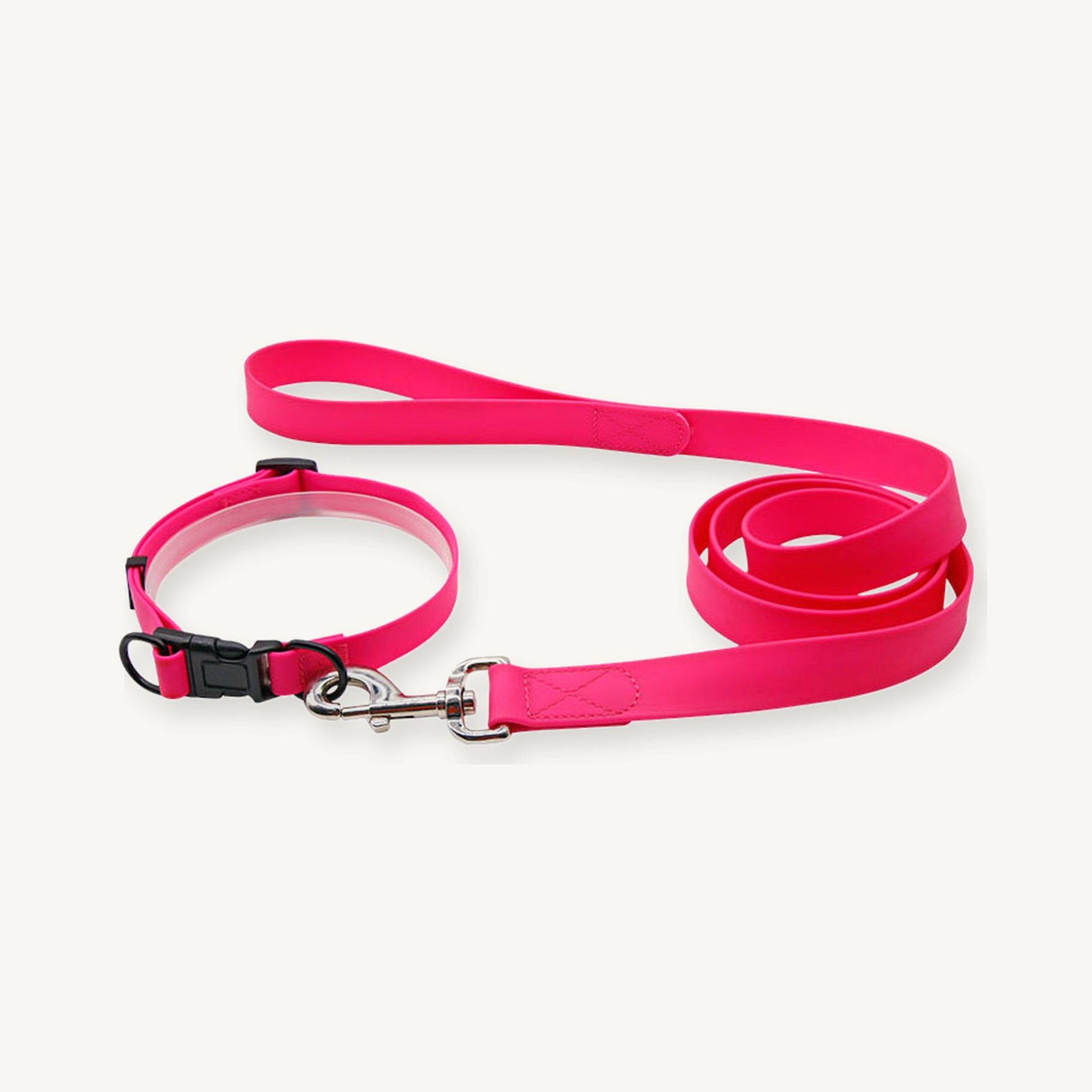 Pink padded PVC dog collar leash set displaying matching collar and long lead