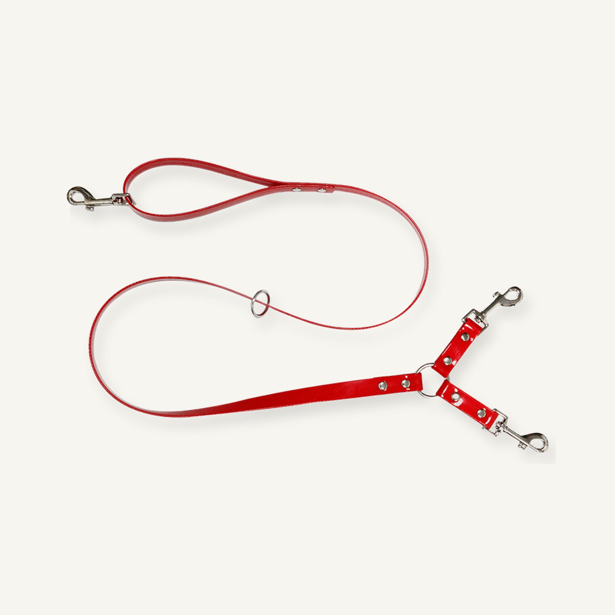 Red TPU double dog leash coupler displaying dual attachment layout and loop handle