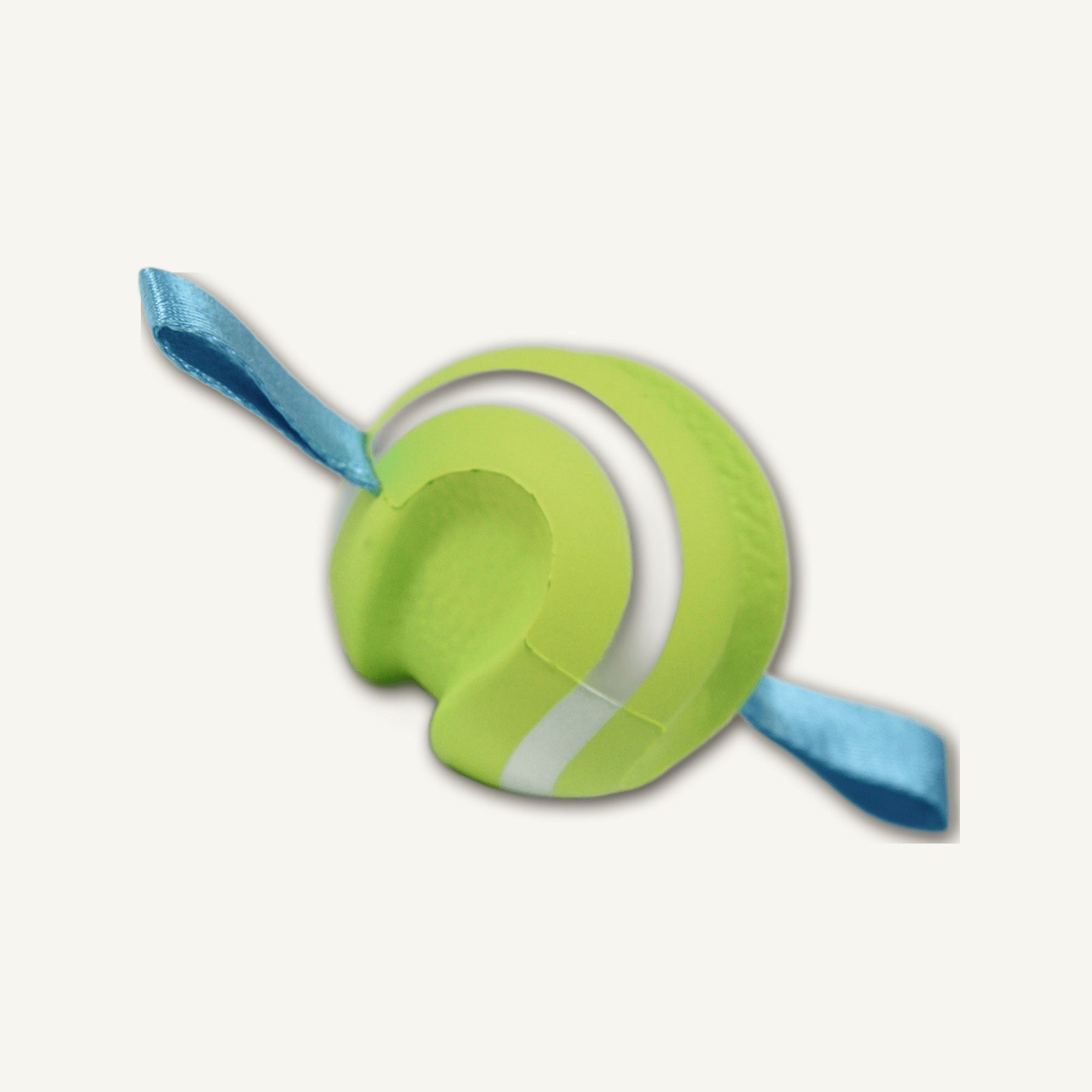 Small Green Foam Tennis Ball – etpu005 rear perspective view on warm neutral background for wholesale pet brands
